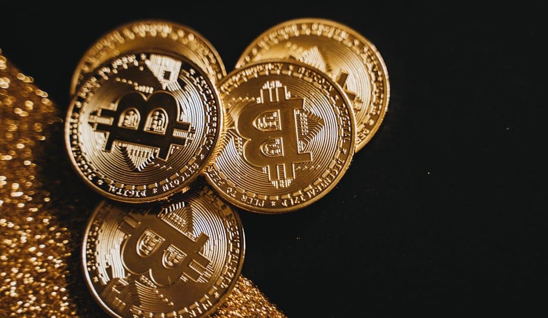 a-detailed-close-up-shot-of-shiny-bitcoin-coins-resting-on-a-glittery-surface-symbolizing-wealth-in